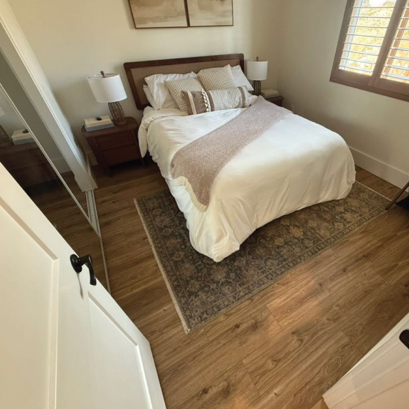 The finished, staged bedroom restored and back to rent-ready