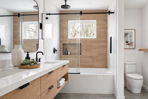 Modern contemporary bathroom with large-format tile and frameless glass