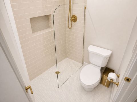 After: redesigned walk-in shower with custom tile and gold fixtures - an on-the-spot design mockup